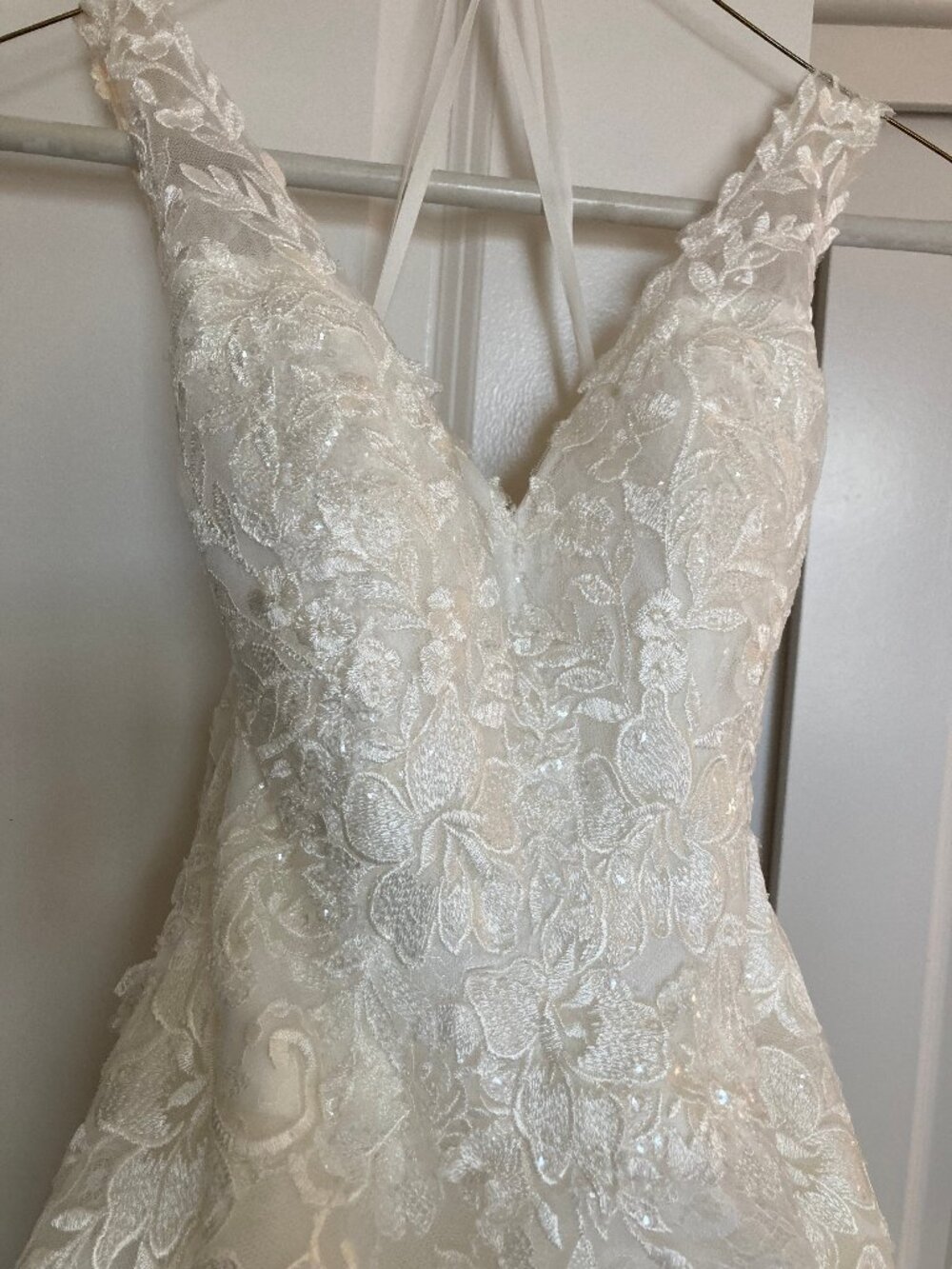 wedding dress: fitted a-line, lace, romantic, sleeveless
